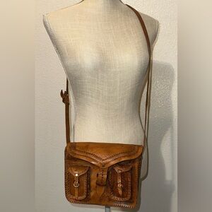 Leather hand tooled cross body purse‎